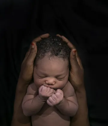 A portrait of Nakaayi SharifahÕs first born child. Nakaayi Sharifah, 27, was the first to give birth at Kawempe Referral Hospital on the 1st of January welcoming the new decade with a beautiful baby girl. Baby Nakaayi is SharifahÕs first child and she was so excited to bring her into the world. Her labor was quite short as she arrived at the hospital at around 6pm on the 31st and delivered at about half past 12 on the 1st. Sharifah is still deciding what to call her newborn, but she has decided on either Sa