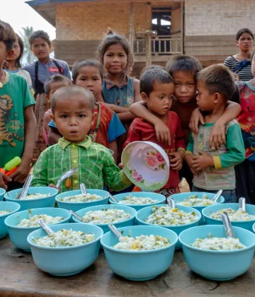 Ms. Kahanh (40) cooking nutritious food. Nutrition is a lifelong issue. The effects of poor nutrition begin in the womb, continue well into adulthood, and cycle across generations. While malnutrition can trap generations of children in a cycle of poverty, good nutrition, particularly in infancy, is the building block for future health and development.