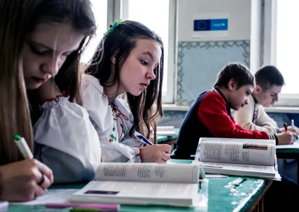 Grade eight students practice reading at secondary school number 5, in Krasnohorivka, Donetsk Oblast, Ukraine, Tuesday 21 November 2017. The students are among those who had to be transferred from nearby school number 2 after it was severely damaged by a shell in May 2017.