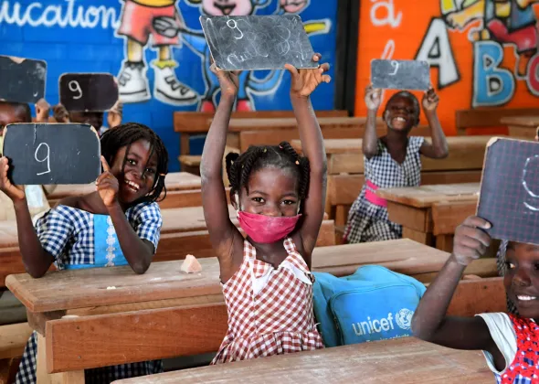 Children attending classes in Toumodi-Sakassou, in the center of Côte d'Ivoire.  Due to COVID-19, the schools were closed for several weeks. Classes started, with the necessary measures. Children wear masks, wash their hands regularly and keep a social distance.
