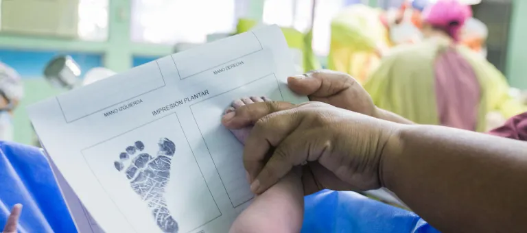 A newborn is being identified before birth registration at the UNICEF baby-friendly policy the General Hospital of San Juan de Dios in the city of Guatemala.