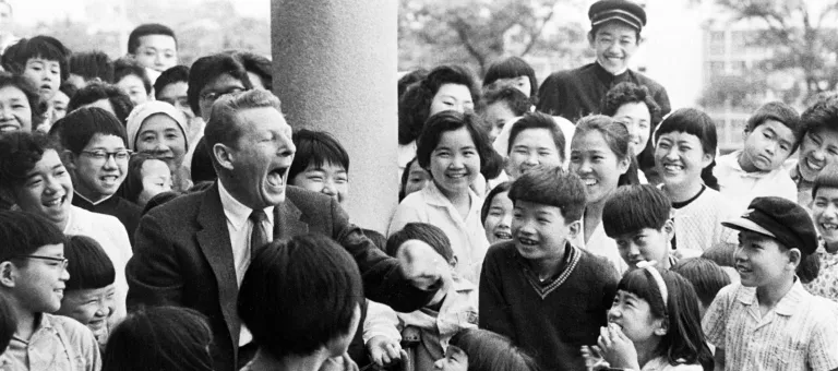 In 1961 in Japan, UNICEF Goodwill Ambassador Danny Kaye attends a "Reunion with Asian Children" in Tokyo, the capital, in which children from seven Asian countries participated. T